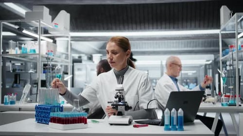 Scientists Working in Modern Lab, Testing Samples