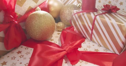 Festive Christmas Ornaments and Wrapped Gifts with Ribbons