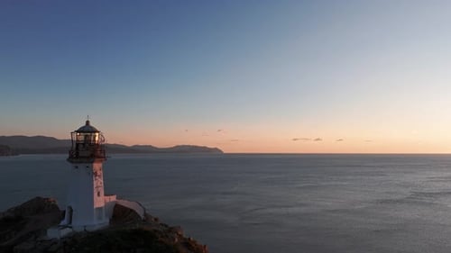 Cliffside Lighthouse Overlooking Ocean