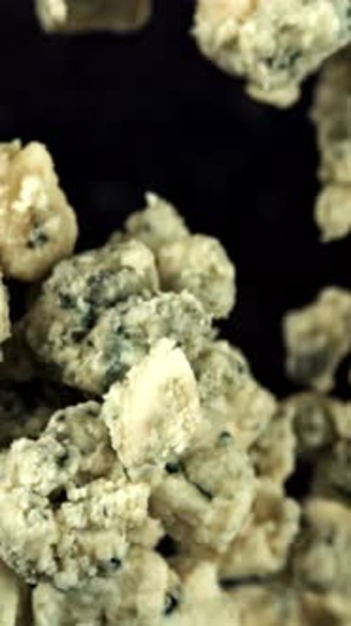 Super Slow Motion Blue Cheese Pieces Filmed on a Highspeed Camera at 1000 Fps