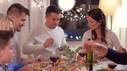 Family enjoying delicious meal and festive celebration indoors