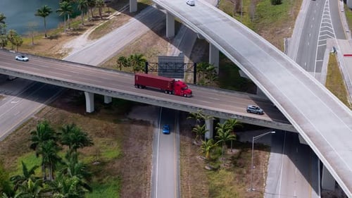 Highway Interchange in Miami City with the Fastmoving Vehicles Showing US Transportation
