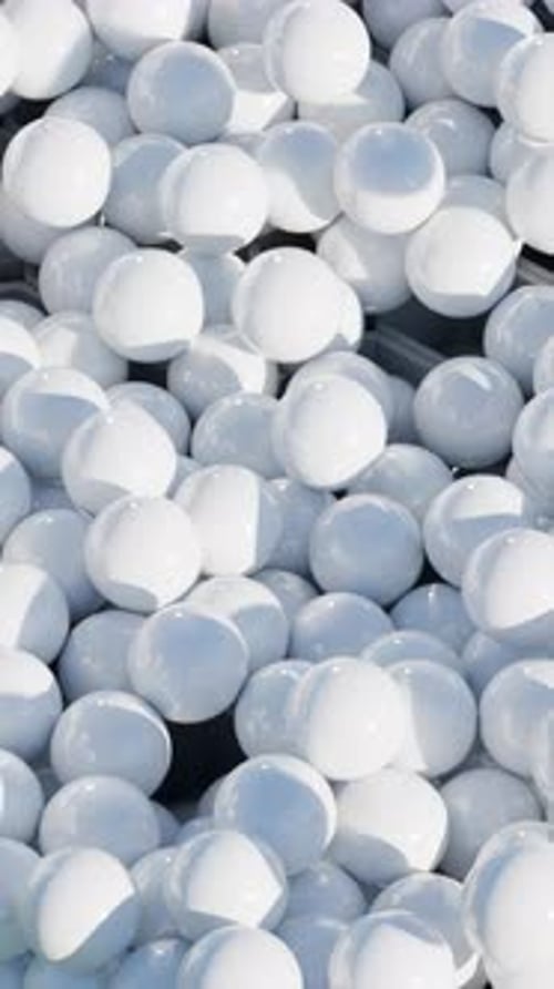 White Spheres Rolling in Abstract Geometric Grid Animation