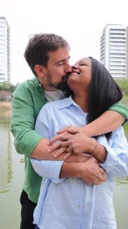 Couple Hugging in a City Park