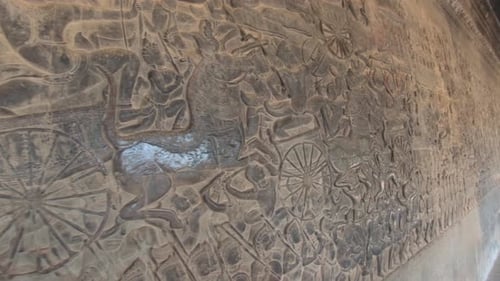 Angkor Wat's extensive stone carving decorations in inner walls. Ancient art