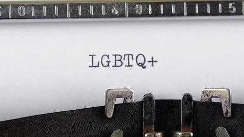 Typing LGBTQ+ on Vintage Typewriter for Diversity