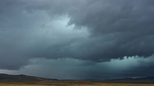 Bolt of lightning strikes the ground during summer monsoon storm in Utah