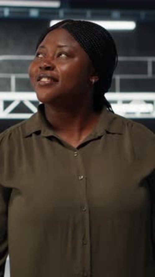 Vertical Video Admin Walking in Data Center Overseeing Large Scale IT Infrastructure