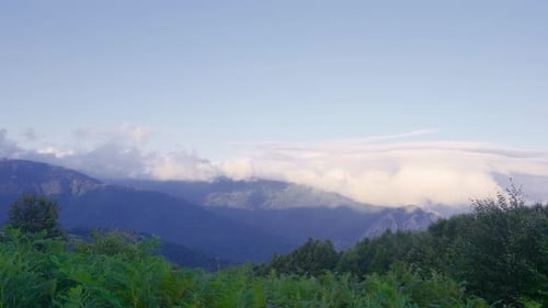 Clouds over the mountain. Mountain view.