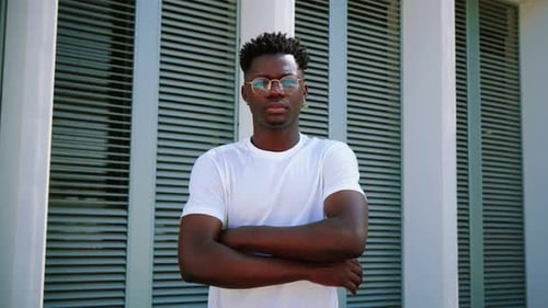 Confident Young Adult Posing Outdoors