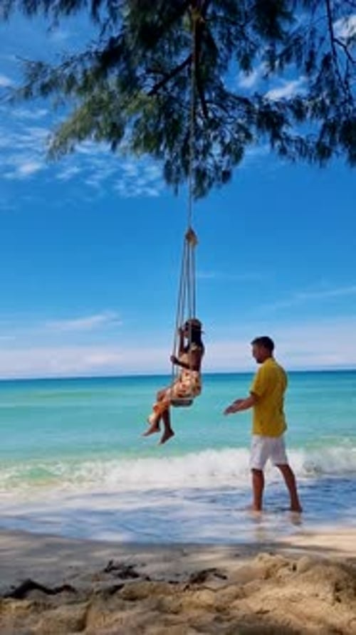 Koh Kood Island Thailand with a White Tropical Beach and Palm Trees at a Turquoise Colored Ocean
