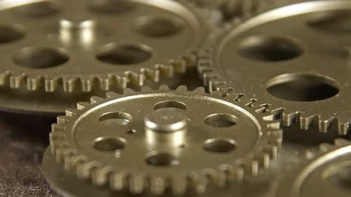 Metal Gears Turning Slowly in Macro Shot