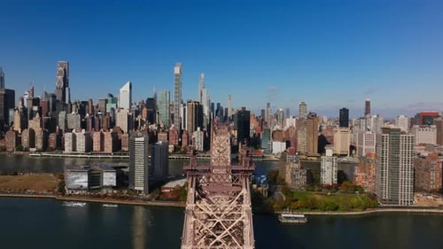 Camera Movement Glides Forward High Above Queensboro Bridge East River and Roosevelt Island
