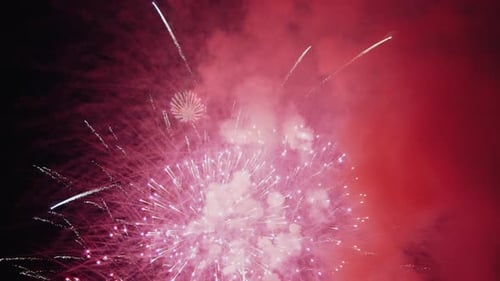 Colorful Explosions of Real Fireworks in Night Sky Slow Motion Video