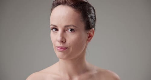 Woman Pouts and Smiles in Close Up Studio