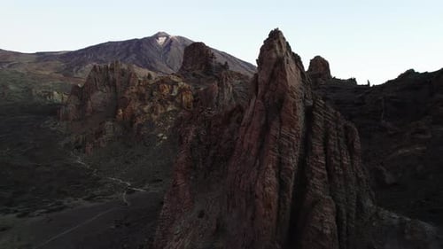 Mountain range in dry deserted landscape of Teide National Park. Scenery of highest volcano
