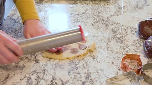 Baking Christmas Gingerbread Cookies in Modern White Kitchen