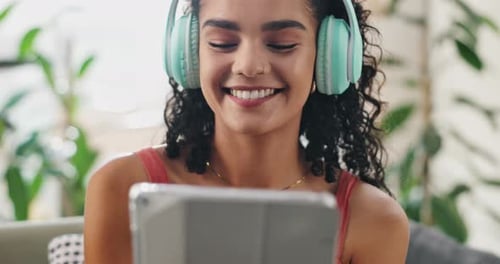 Woman, headphones and tablet or dancing to music for online entertainment for audio