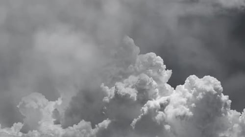 Thunderbolt and storm in gray dark clouds.