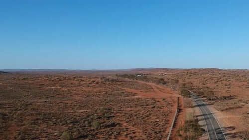 Australian outback road curving into the distance