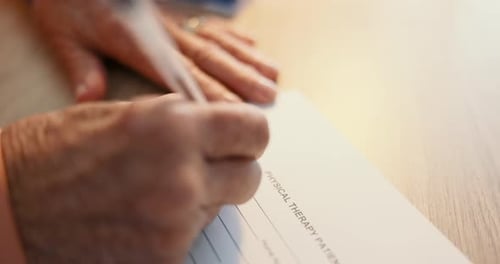 Filling Out Patient Form for Physical Therapy