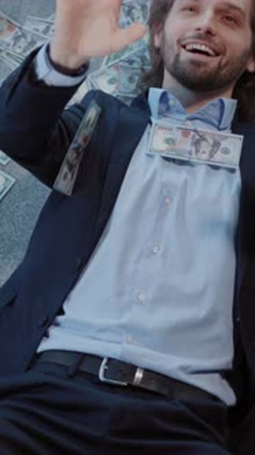 A Welldressed Man Showcases Wealth in Various Indulgent Scenarios