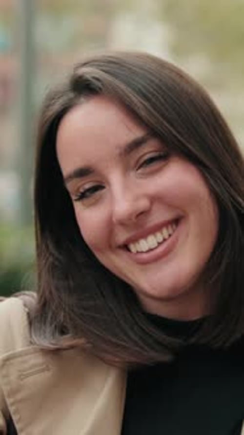 Vertical video, Close up of the Happy Woman Smiling in the City
