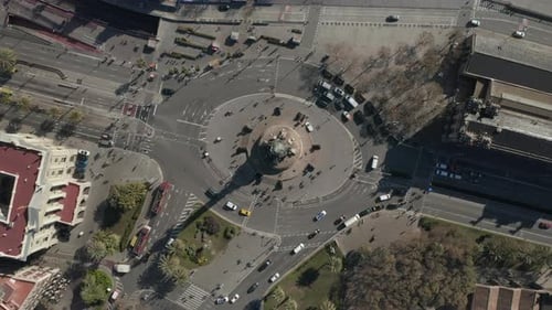 Top Down Rotating Shot of Square with Roundabout Around Famous Columbus Monument