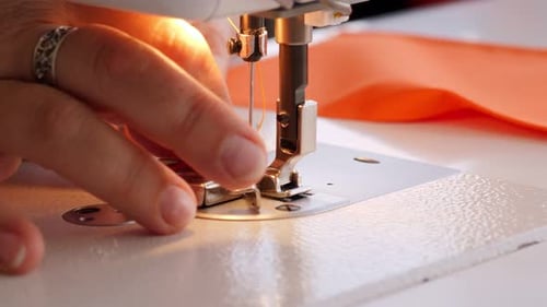 Threading Needle on a Sewing Machine, Close Up
