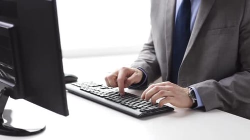 People, Business, Technology and Office Work Concept - Close Up of Businessman