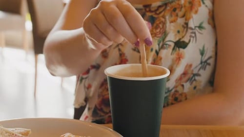 Woman Drinking Coffee From Paper Black Cup In Cafe Greece Corfu