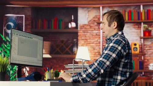 Programmer in Home Office Having Deadline Stressed to Finish Debugging Software