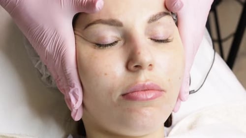 Facial Rejuvenation Treatment with Cream at the Spa
