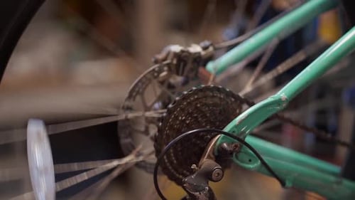Bicycle spokes in motion. Spinning fast in slow motion.