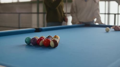 Billiard Balls Scattering across Pool Table after Break Shot