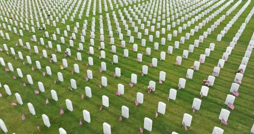 Sarasota National Cemetery with Many White Tombstones on Green Grass Lawn Memorial Day Concept