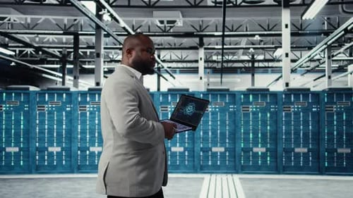 Data Center Admin Doing IT Maintenance Tasks Using AI Technology