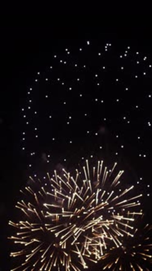 Celebratory Fireworks Light Up the Night Sky Welcoming a Joyful Holiday Season Filled with Fun and