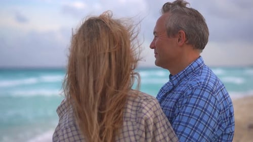 Romantic Middleaged Couple Enjoying a Peaceful Evening Together on the Beach Love Connection and