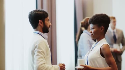 Business Professionals Networking at Corporate Conference Event