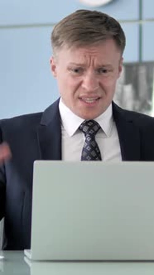 Businessman Upset by Loss, Vertical Video