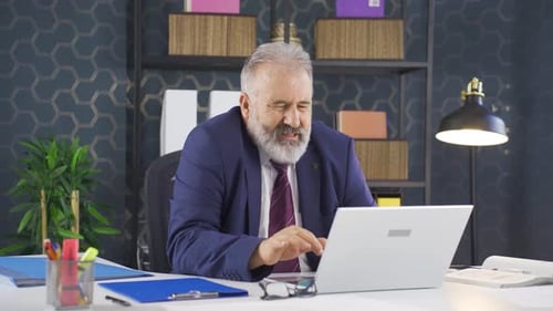 Business Man Experiencing Neck and Shoulder Pain