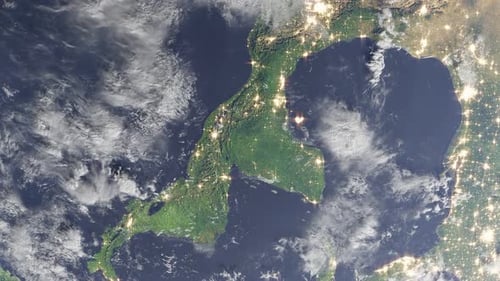 planet earth view from the space with weather forecast clouds hurricane tsunami and main city light