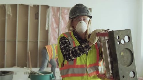 Confident Woman Supervising Office Renovation