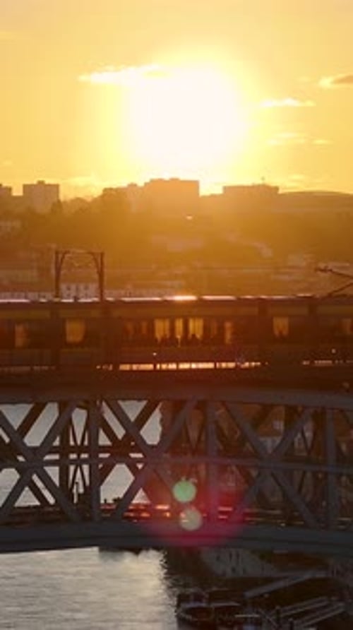 Sunset Skyline on Luis I Bridge At Porto In Porto District Portugal.