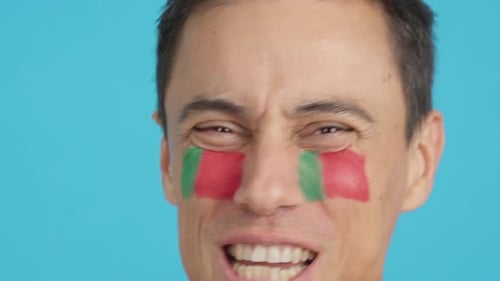 Close Up of a Man Supporting Portuguese Team