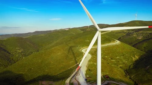 Wind Turbines on Green Hills Aerial View
