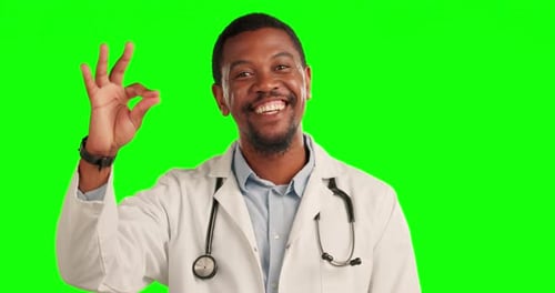 Thank you, doctor with okay hand emoji and in a green screen for healthcare