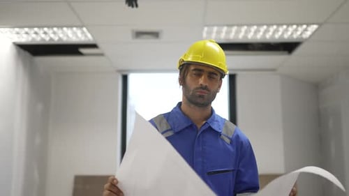 Engineer is working at tower.