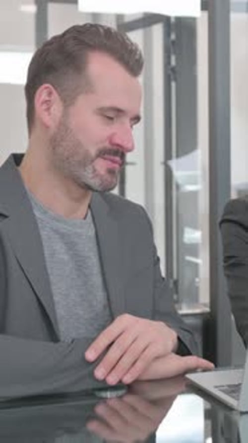 Man in Business Attire having a Video Call